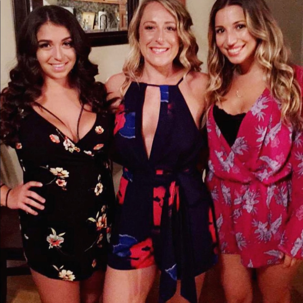 Black with flowers tie in front romper